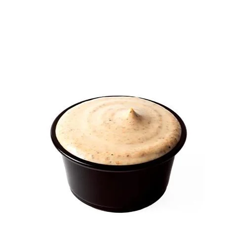 Trufa Sauce en una tarrina negra